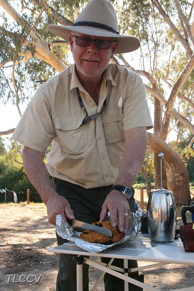 Mike with bread and damper.JPG